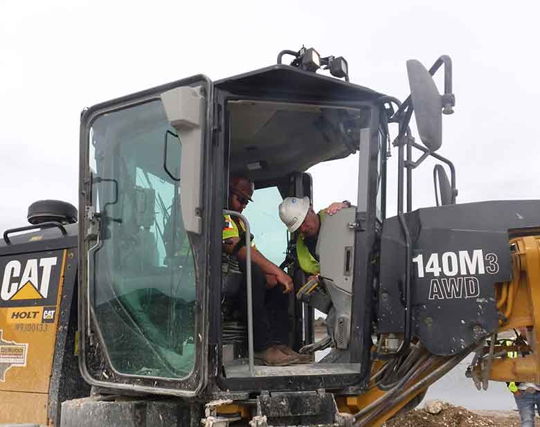 Man Sitting in the Crane